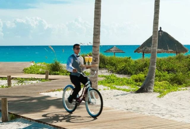 Sandals Land Vacation serving drinks